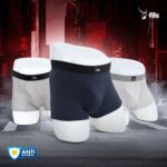 Three pairs of men's underwear in different colors on a dark background with 'fils' branding.