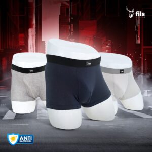 Three pairs of men's underwear in different colors on a dark background with 'fils' branding.