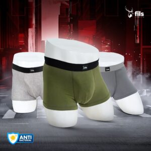 Three pairs of men's underwear in green, gray, and white on a dark background with 'fils' branding.