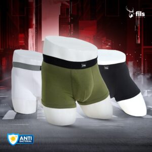 Three pairs of men's underwear in white, green, and black on a dark background with 'fils' branding.