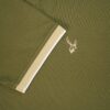 Green fabric with a fils logo on a green background