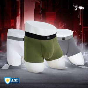 Three pairs of men's underwear in white, green, and gray on a dynamic background with 'fils' branding.