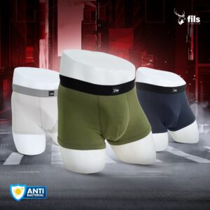 Three pairs of men's underwear in white, green, and black on a dark background with 'fils' branding.